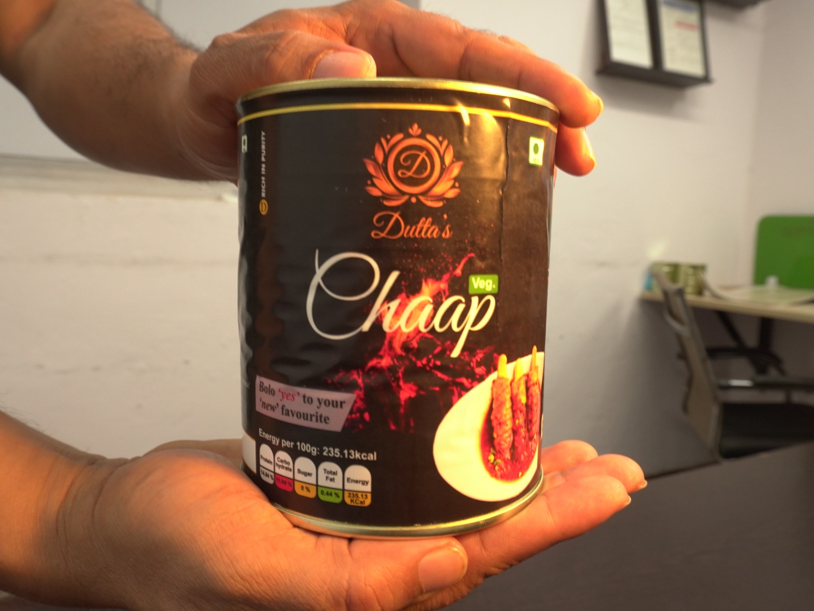 McCain French fries on plate, with hand picking up a fry